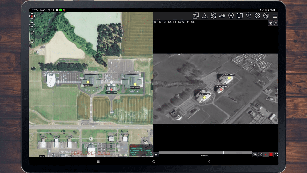 A tablet screen displays satellite imagery: the left side shows a colored map of buildings and fields, while the right side shows a black-and-white thermal image of the same area.